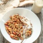 Bowl of high-protein granola with almonds, seeds, and milk — keto-friendly, diabetic-safe breakfast option